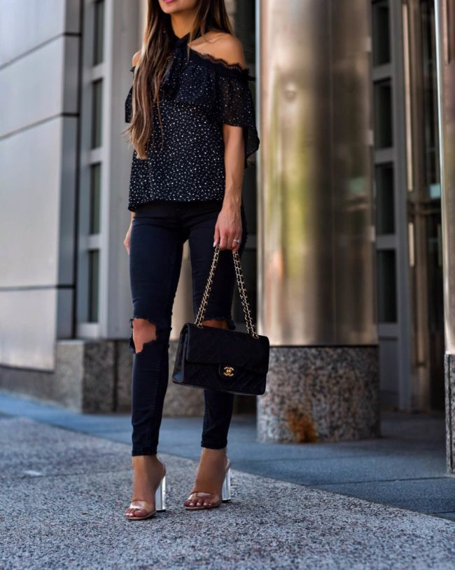 Black Ripped Skinny Jeans, Off-Shoulder Top, and Clear Block Heels — Heels with Jeans Outfits