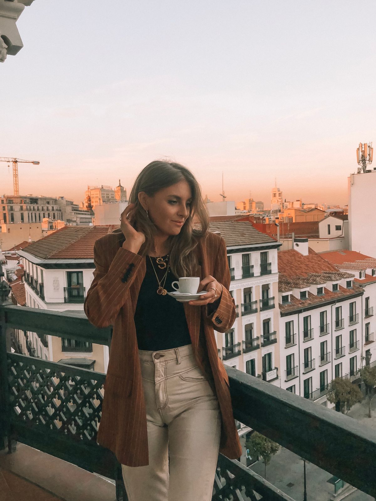 Pinstripe Blazer with Black Top and Beige Trousers Pinstripe Blazer with Black Top and Beige Trousers — Madrid Outfits