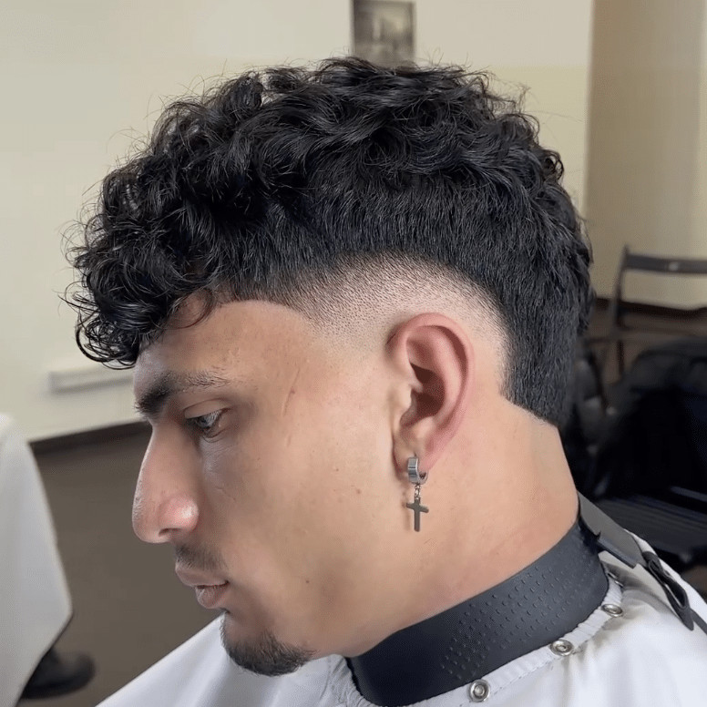 Thick Wavy Hair With Dramatic Fade — Burst Fade