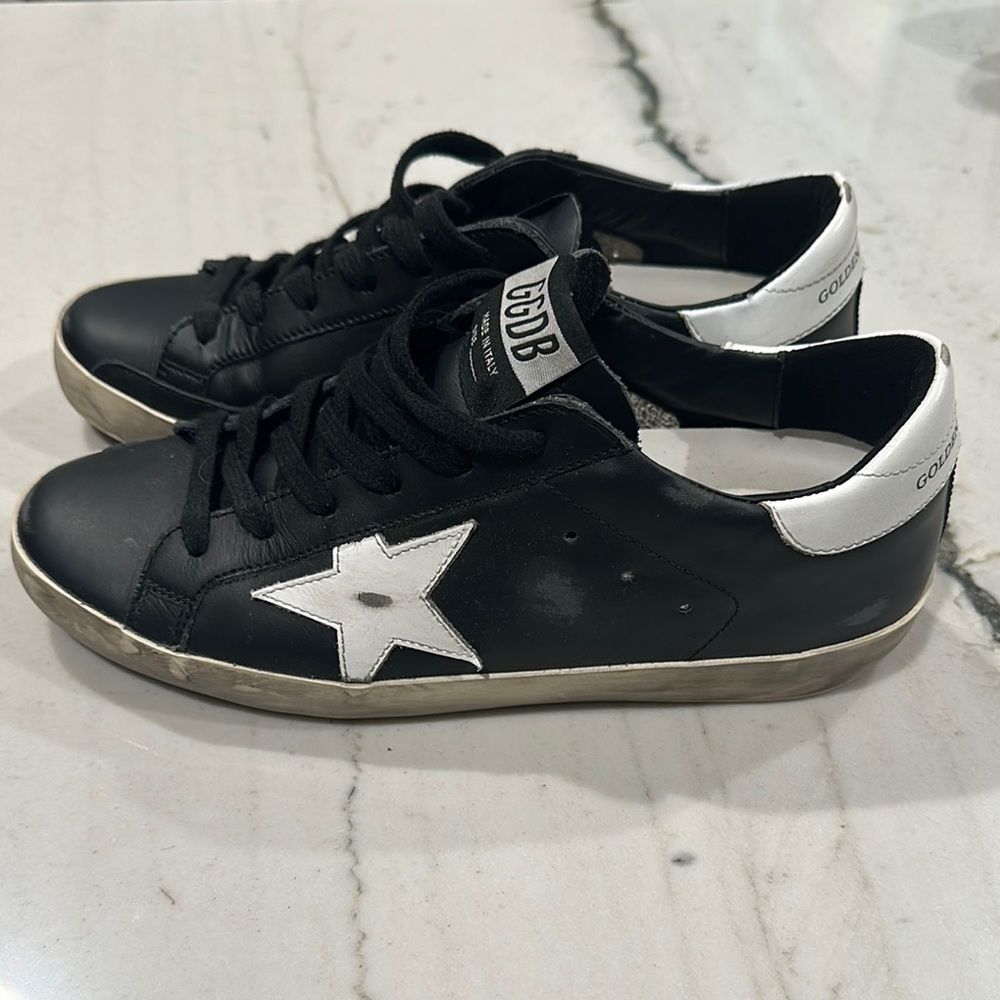 Black Leather Sneakers with White Star Appliqué — Golden Goose Outfits