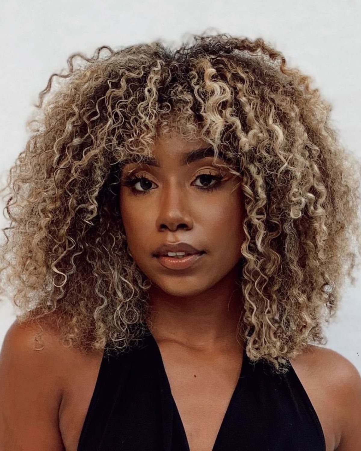 Collarbone Butterfly With Voluminous Curls — Butterfly Haircut Curly Hair