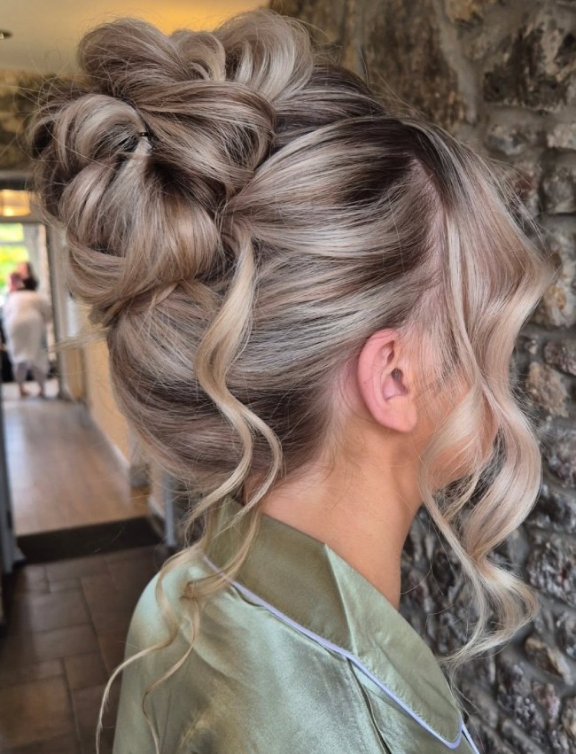 Mid-Back High Bun with Braids and Tendrils Mid-Back High Bun with Braids and Tendrils — Formal Hairstyles