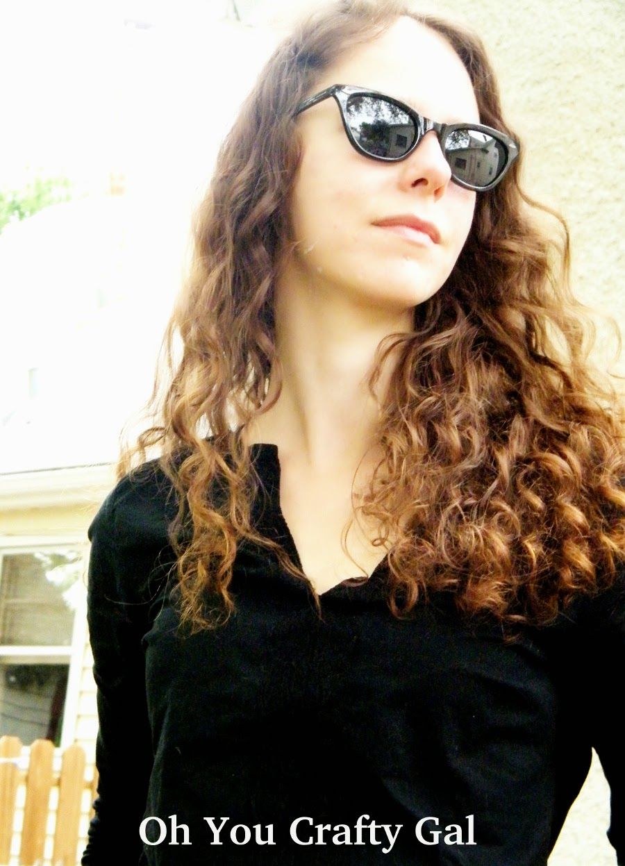Black Cat-Eye Sunglasses with Long-Sleeve Top — Sunglasses for Heart Shaped Face