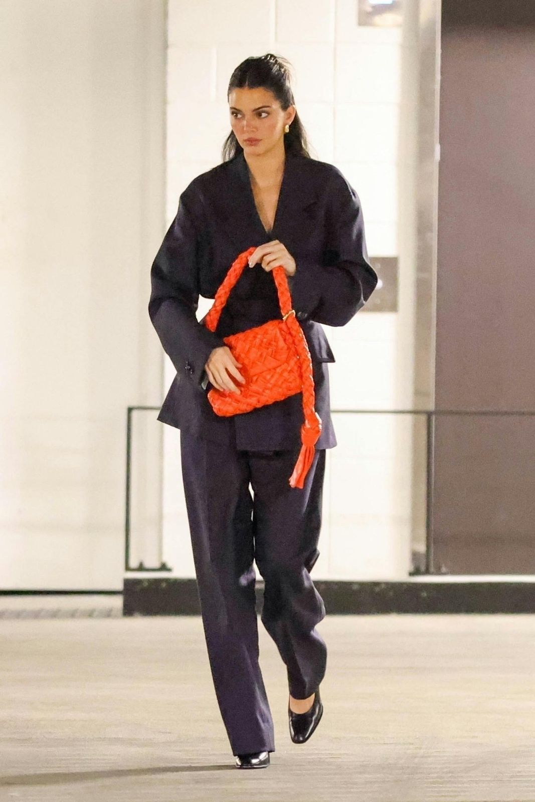 Oversized Black Suit with an Orange Woven Leather Shoulder Bag Oversized Black Suit with an Orange Woven Leather Shoulder Bag — Bottega Veneta Bag Outfits