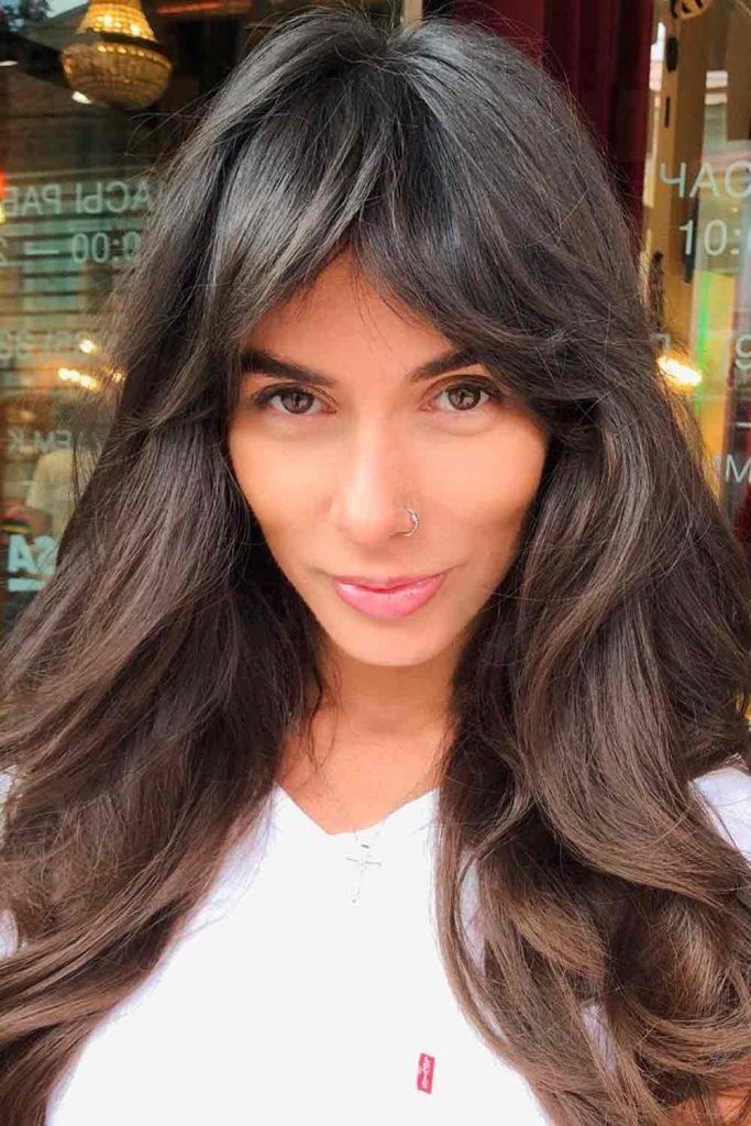 Long Waves With Thick Full Bangs — Hairstyles for Big Forehead