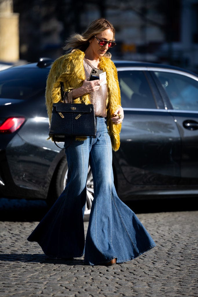 Statement Yellow Coat Over Sequined Top and Extreme Flares — Flare Jeans Outfits