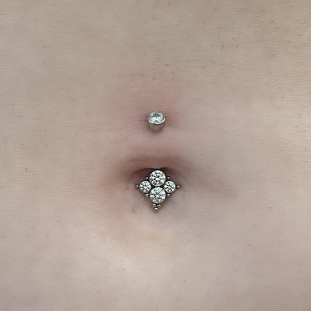 Gem Cluster Accent: Silver Belly Ring with Stone Arrangement — Belly Button Piercing Ideas