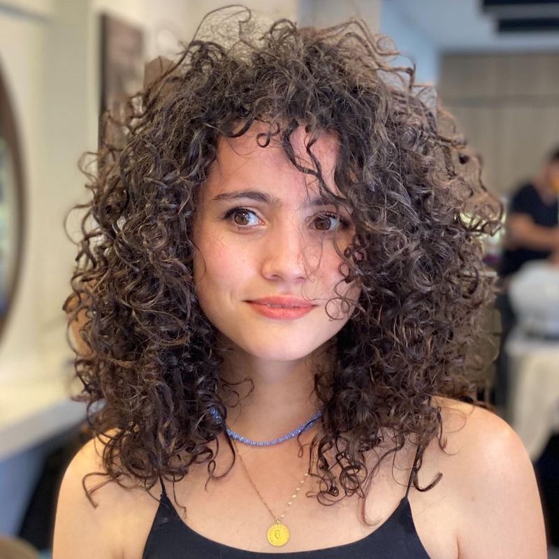 Collarbone Dark Brown Tight Curls Collarbone Dark Brown Tight Curls — Spiral Perm