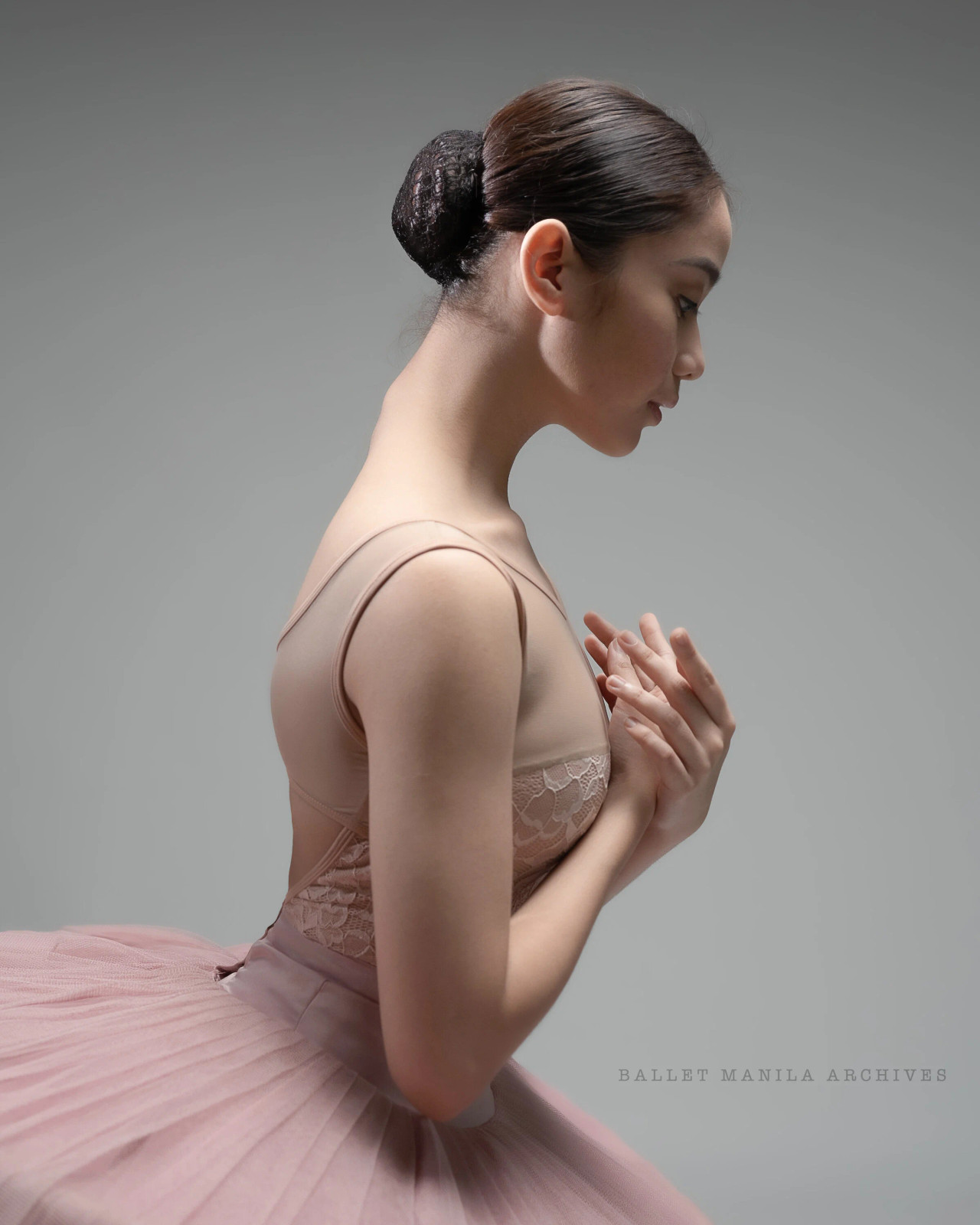 Neat Low Bun With Side Part Neat Low Bun With Side Part — Ballerina Bun