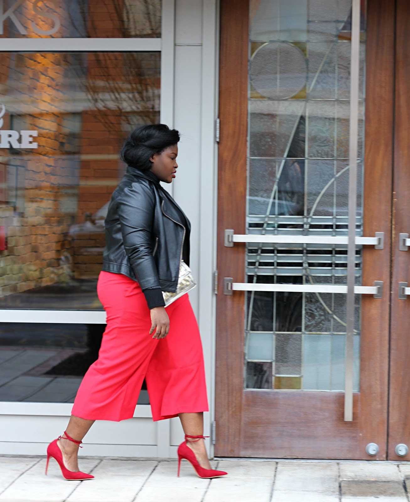 Red Culottes and Matching Pumps with a Leather Jacket and Turtleneck — Pumps Outfits