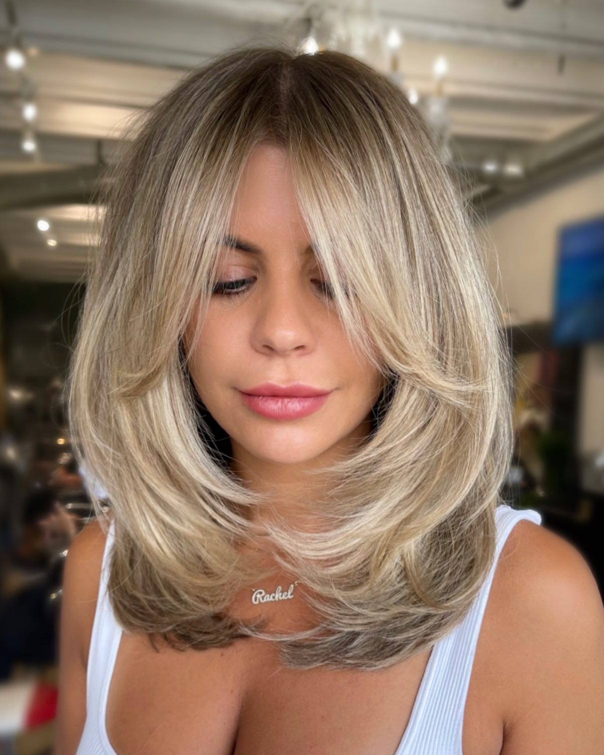 Ash Blonde Butterfly With Curtain Bangs — Butterfly Haircut Medium Hair