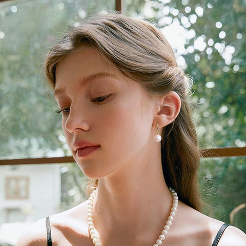 Gold Pearl Drop Earrings and Necklace with a Black Top Gold Pearl Drop Earrings and Necklace with a Black Top — Pearl Earrings Outfits