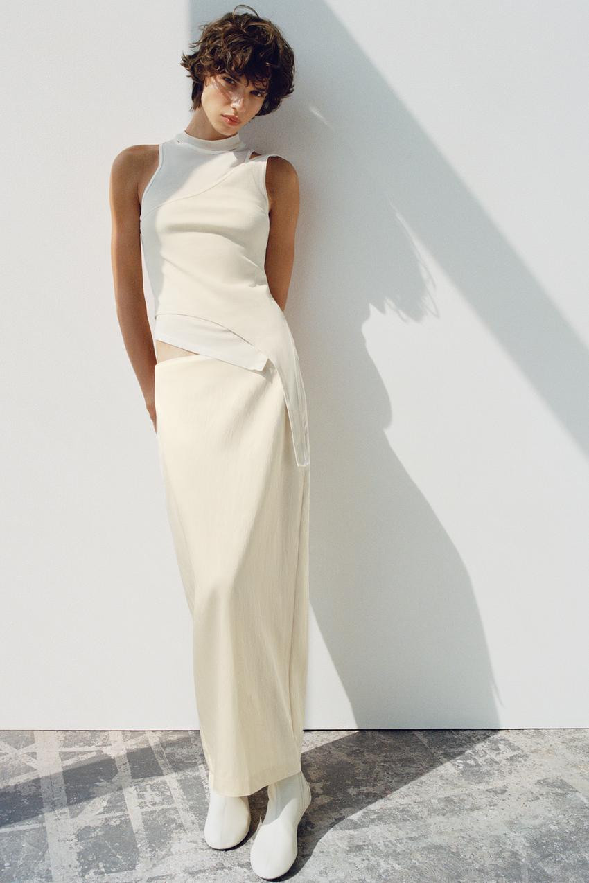 Off-White Satin Maxi Skirt with Asymmetrical Top for Modern Evening Off-White Satin Maxi Skirt with Asymmetrical Top for Modern Evening — Satin Skirts