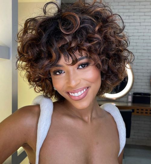 Textured White Off-the-Shoulder Top with Highlighted Bangs Textured White Off-the-Shoulder Top with Highlighted Bangs — Curly Bangs