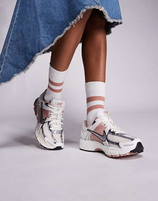 Feminine Athleisure: Denim Skirt and White Vomero — Nike Vomero Outfits