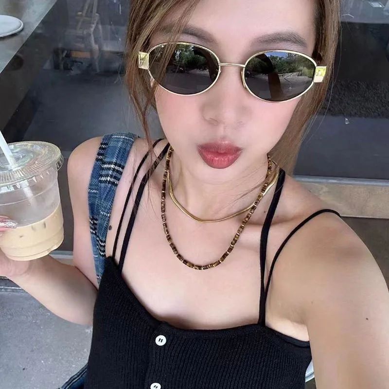 Black Ribbed Tank Top and Layered Necklaces with Gold Oval Sunglasses — Oval Sunglasses Outfits