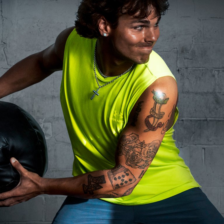 High-Energy Gym Style: Neon Yellow Sleeveless Tank Top and Blue Shorts — Mens Gym Outfits