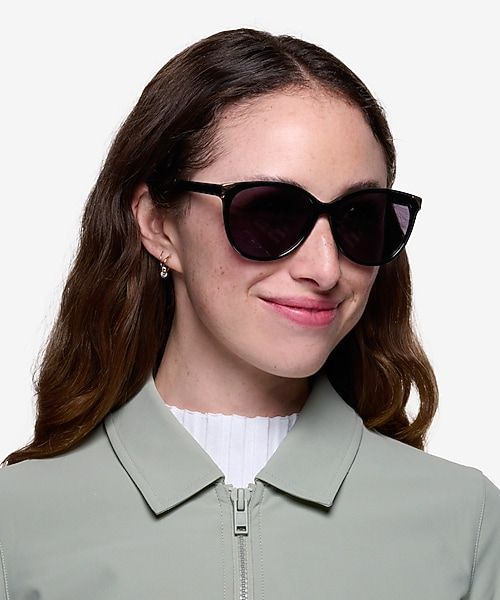 Black Cat-Eye Sunglasses with Sage Green Jacket — Sunglasses for Heart Shaped Face
