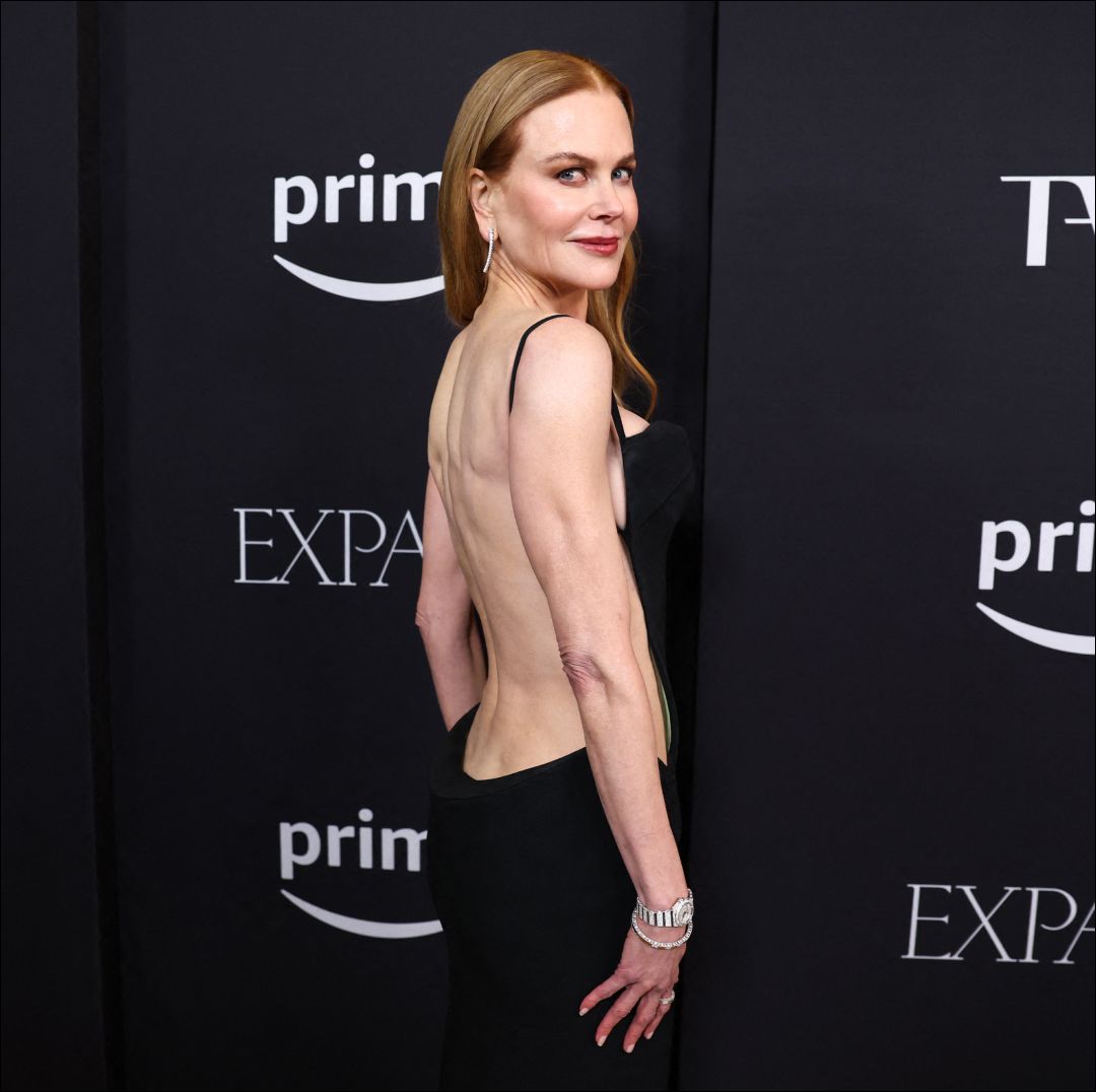 Sleek Black Dress with Deep Plunging Back Sleek Black Dress with Deep Plunging Back — Backless Dresses