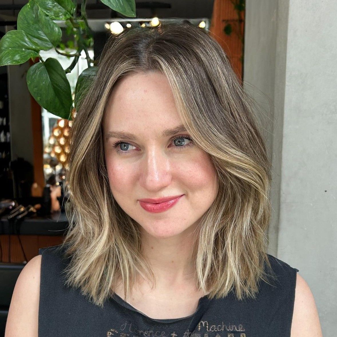 Collarbone Lob With Wispy Bangs — Hairstyles for Big Forehead