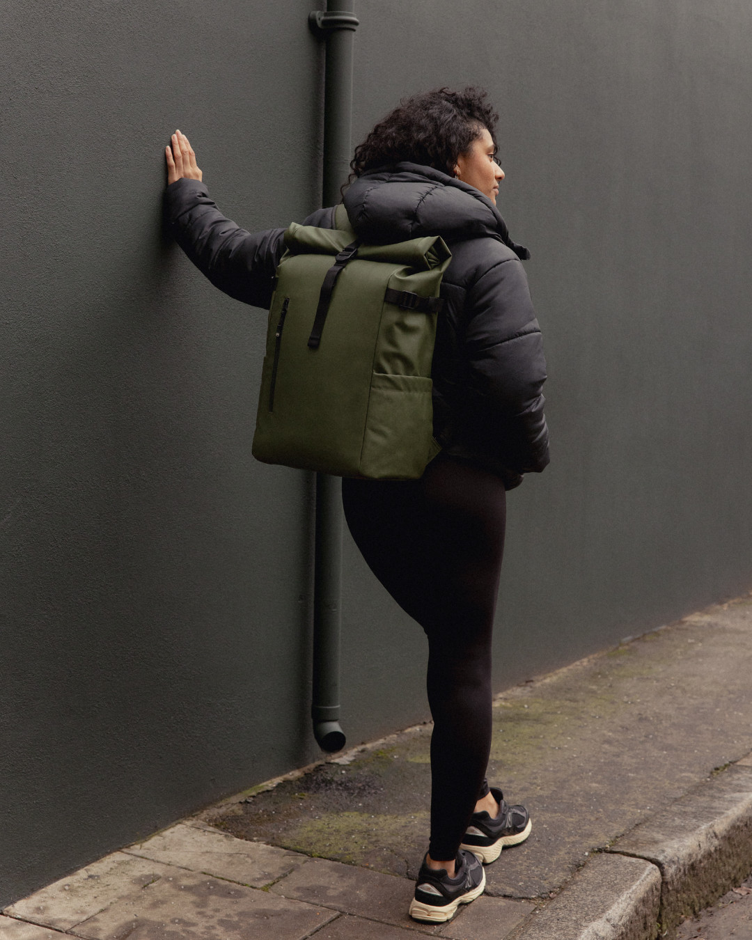 Practical Travel: Olive Backpack with Black Leggings and Puffer Jacket — Backpack Outfits Women