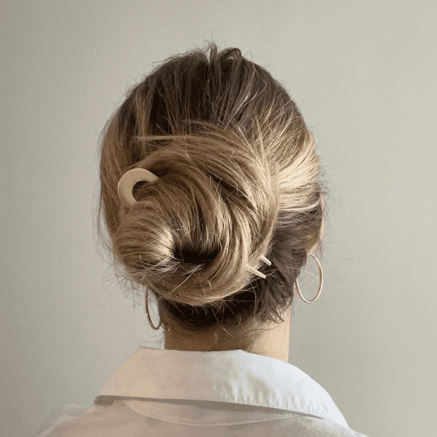 Messy Bun With A Hair Stick — Easy Hairstyles for Medium Hair
