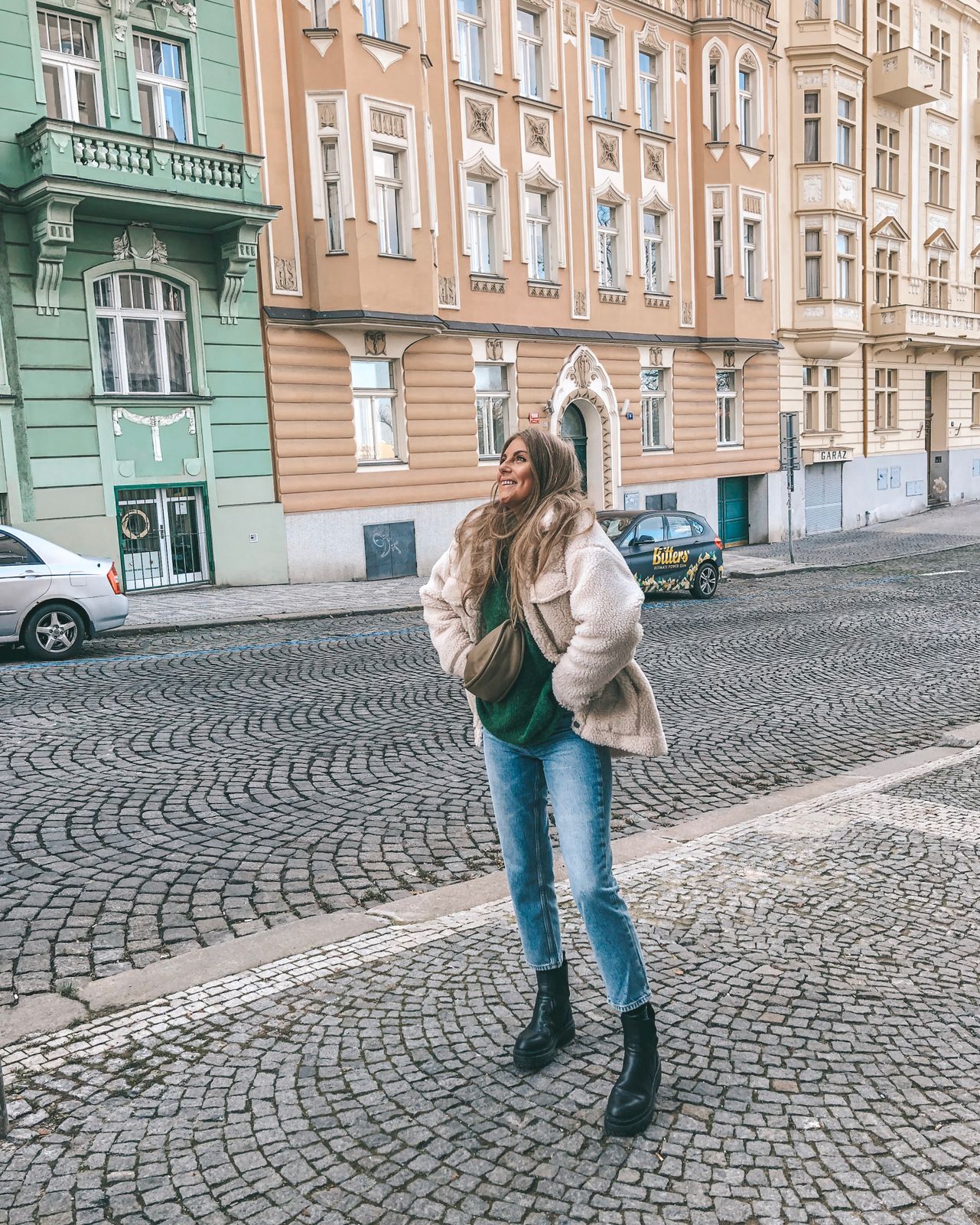 Cream Teddy Coat with Blue Jeans and Combat Boots — Prague Outfits