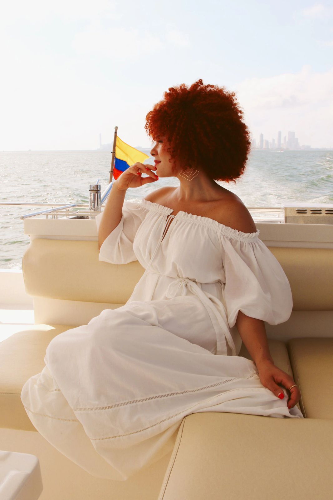 Bohemian Vacation: White Off-Shoulder Maxi Dress on a Yacht — Cartagena Outfits