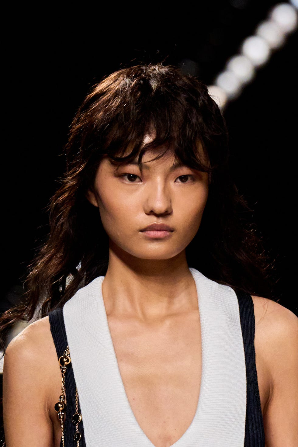 Dark Brown Mid-Back Waves With Face-Framing Layers — Hairstyles for Growing Out Bangs