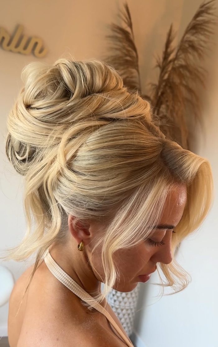 37 Elegant Wedding Hairstyles: Soft Twisted Bridal Updo for Blonde Hair