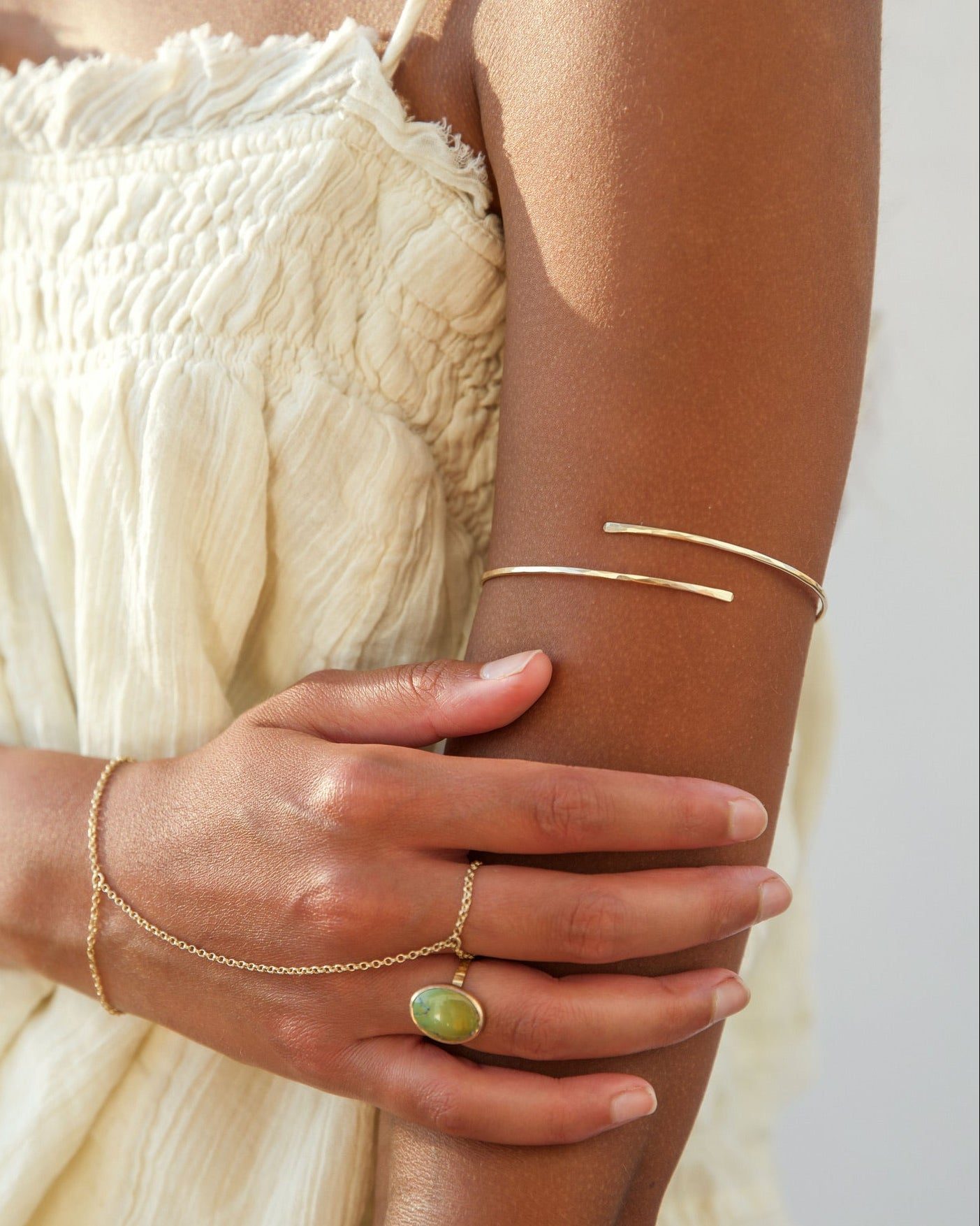 Gold Arm Cuff and Hand Chain with Textured Dress Gold Arm Cuff and Hand Chain with Textured Dress — Gold Jewelry
