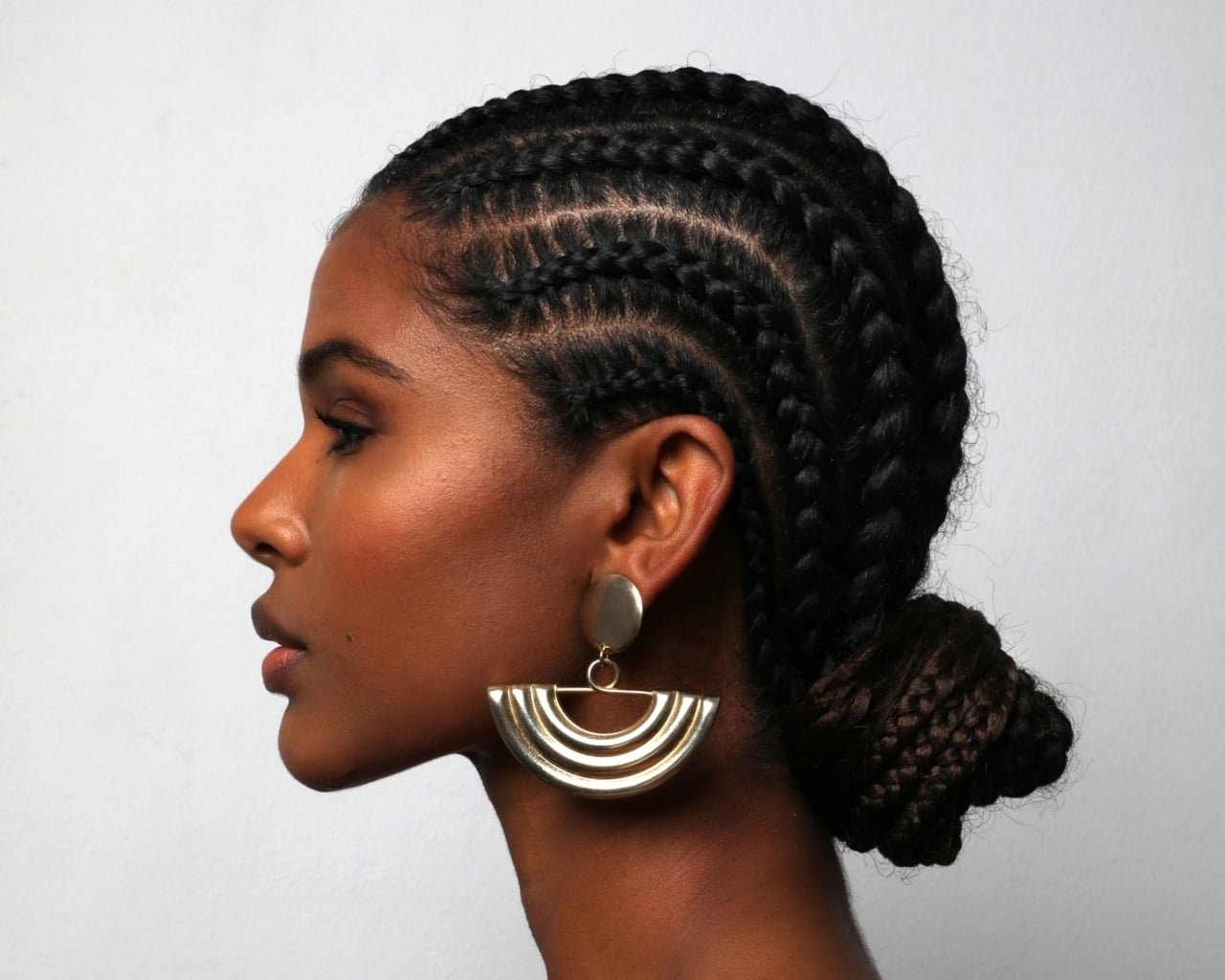 Cornrows into a Low Bun Cornrows into a Low Bun — Protective Hairstyles