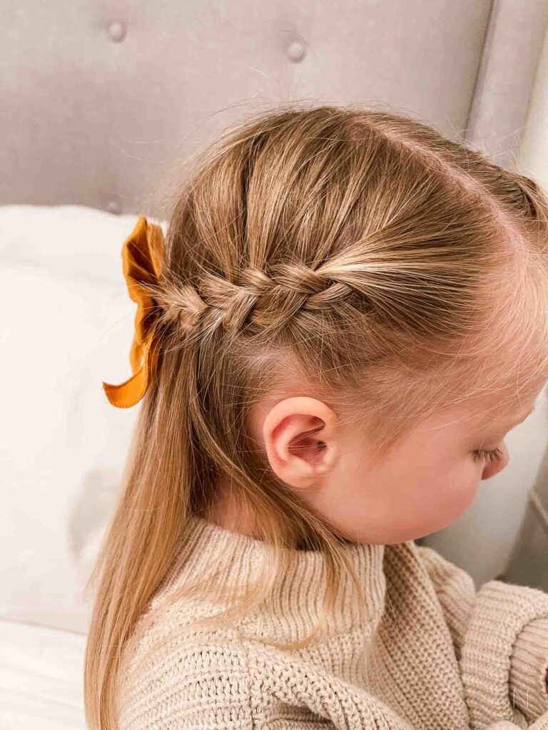 Mid-Back Half-Up with Braid and Bow Detail Mid-Back Half-Up with Braid and Bow Detail — Middle School Hairstyles