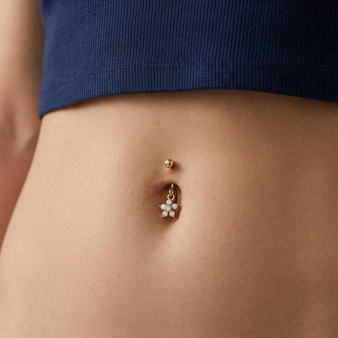 Dainty Sparkle: Gold Dangle Belly Ring with Flower Charm — Belly Button Piercing Ideas