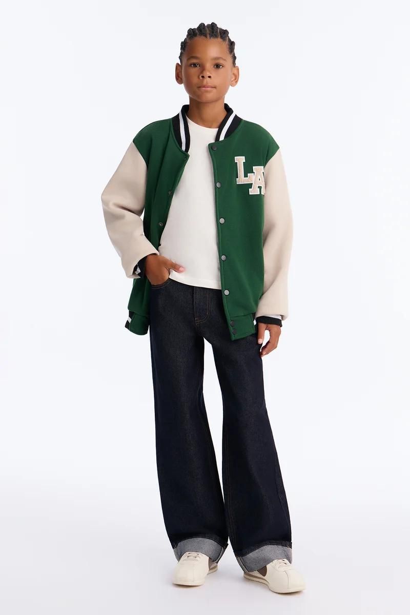 Cotton Denim Varsity Jacket with Wide-Leg Jeans and Sneakers Cotton Denim Varsity Jacket with Wide-Leg Jeans and Sneakers — Varsity Jacket Outfits