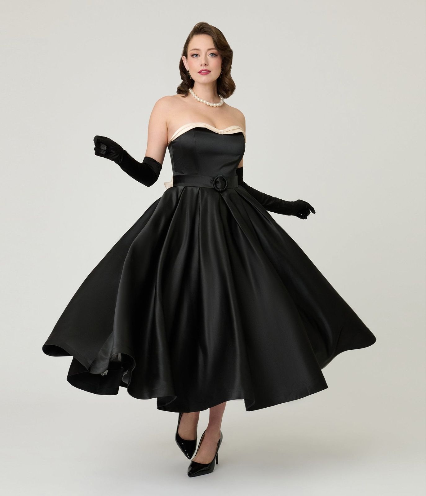 Black Strapless Satin Gown with Full Circle Skirt and Gloves Black Strapless Satin Gown with Full Circle Skirt and Gloves — Tea Length Dresses