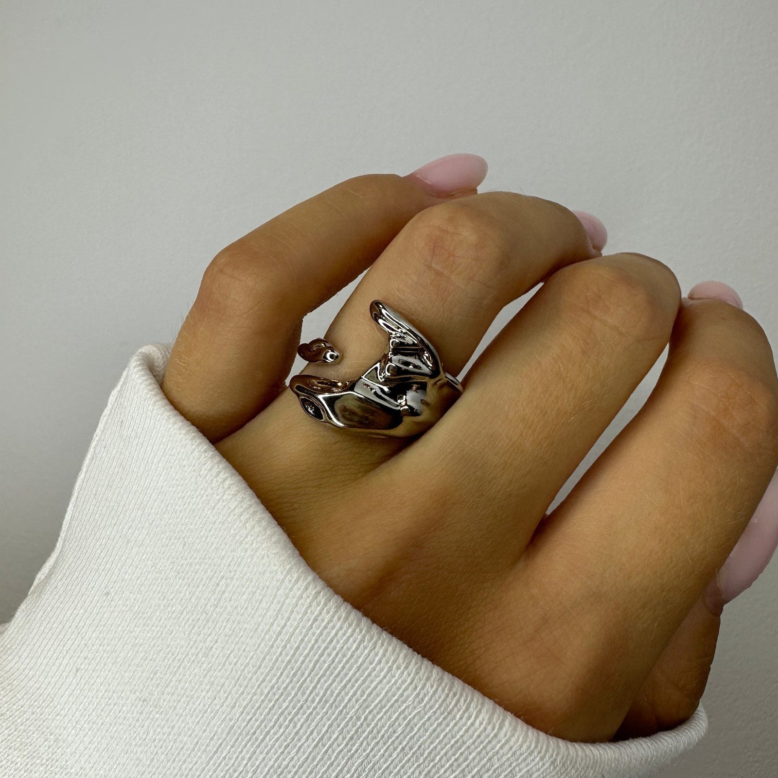 Sculptural Wing Design Silver Ring with White Sweater — Chunky Rings