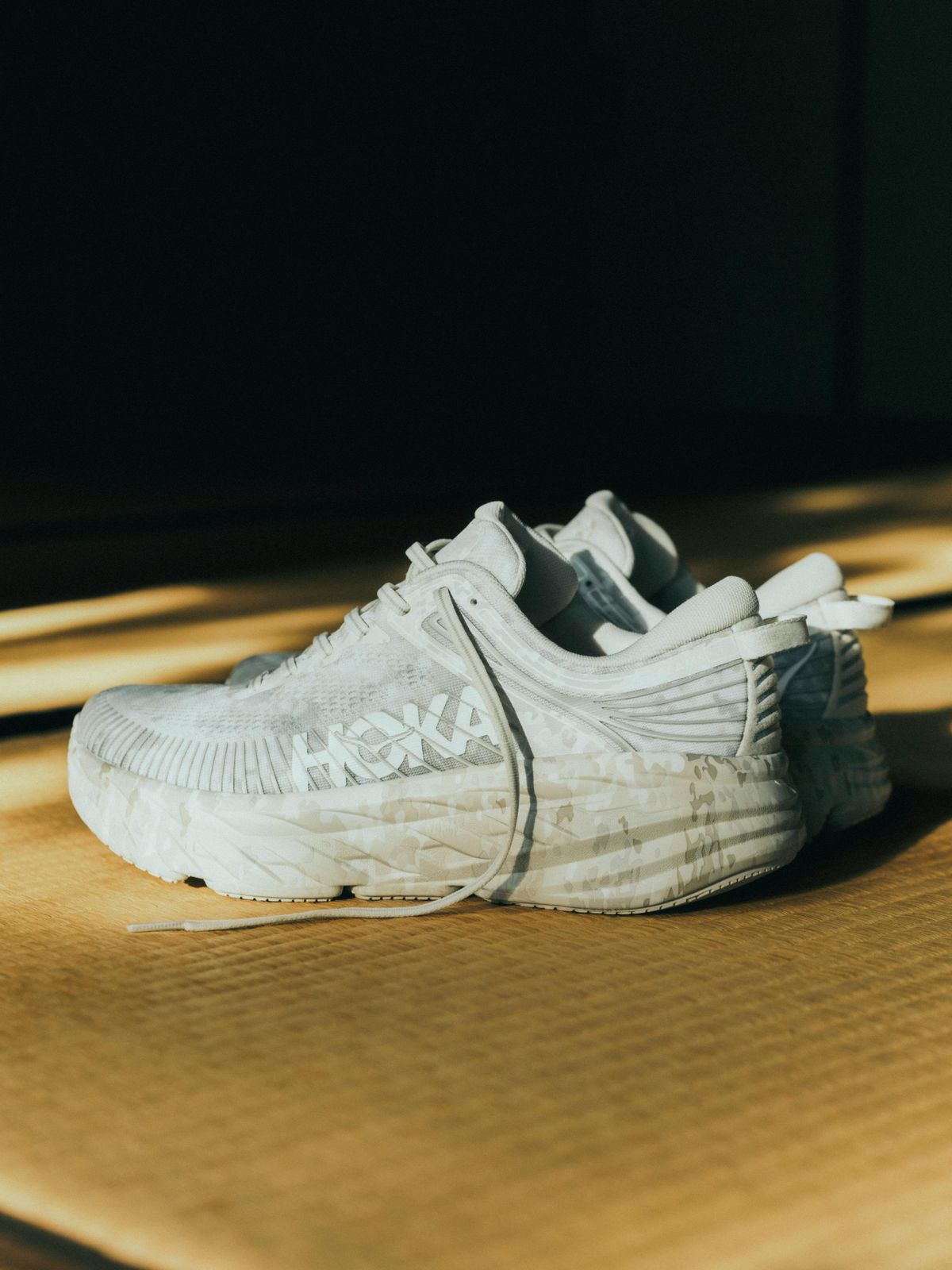 White Hoka Sneakers with Intricate Patterned Detailing White Hoka Sneakers with Intricate Patterned Detailing — Hoka Outfits