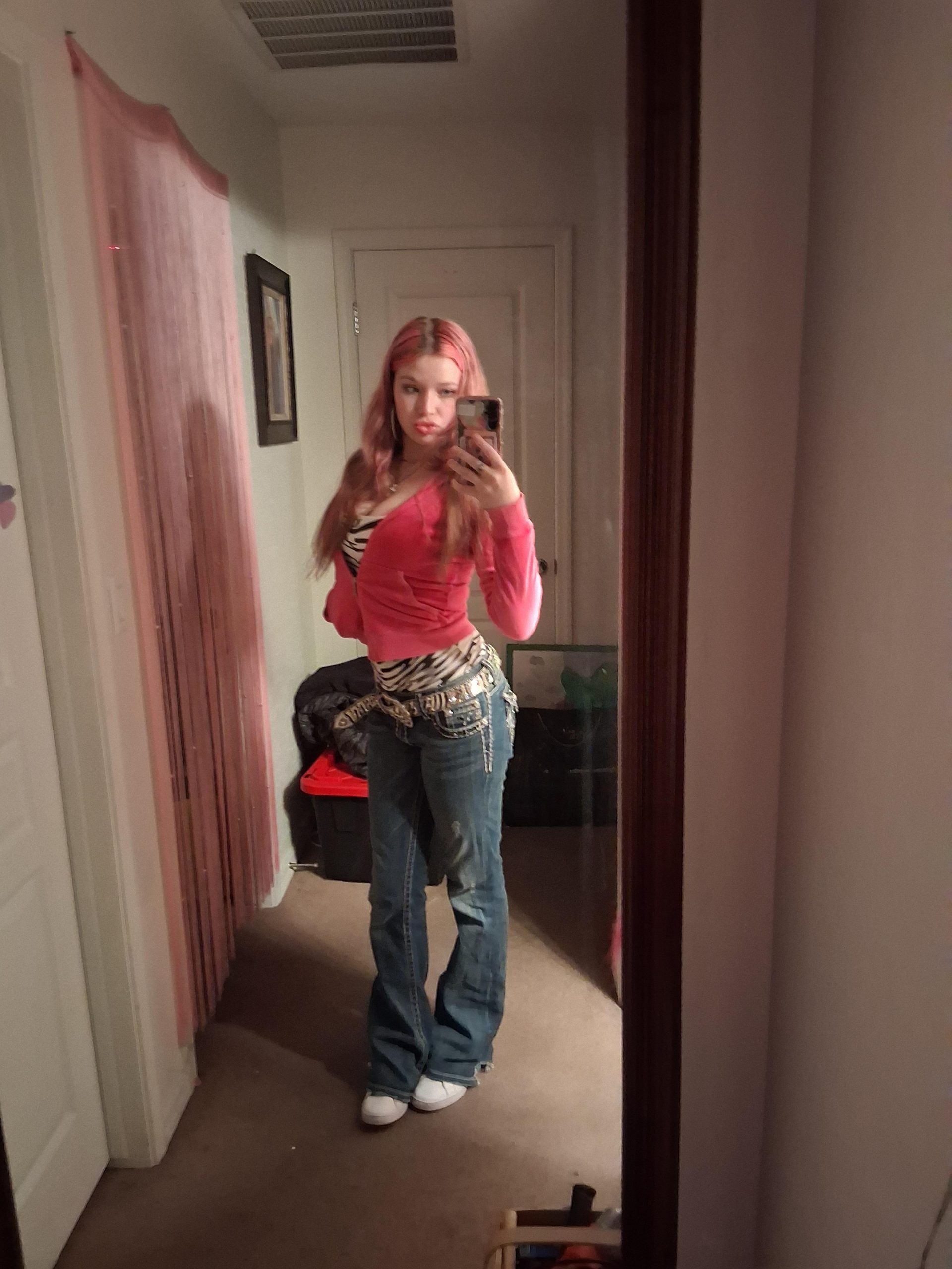 Pink Velour and Zebra Belt: Casual Chic with Flared Jeans Pink Velour and Zebra Belt: Casual Chic with Flared Jeans — McBling Outfits