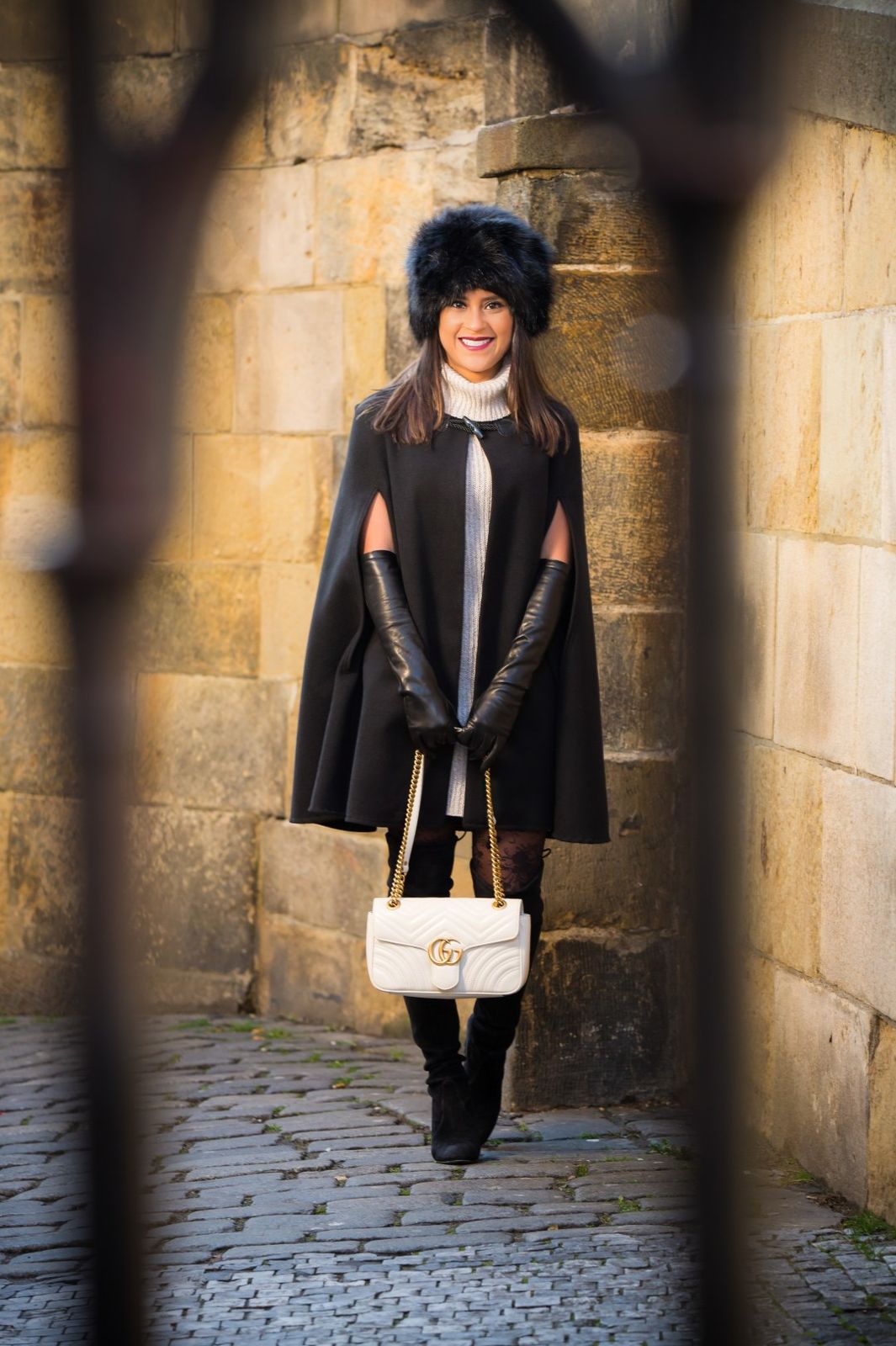 Black Cape Over Grey Sweater Dress with Fur Hat — Prague Outfits