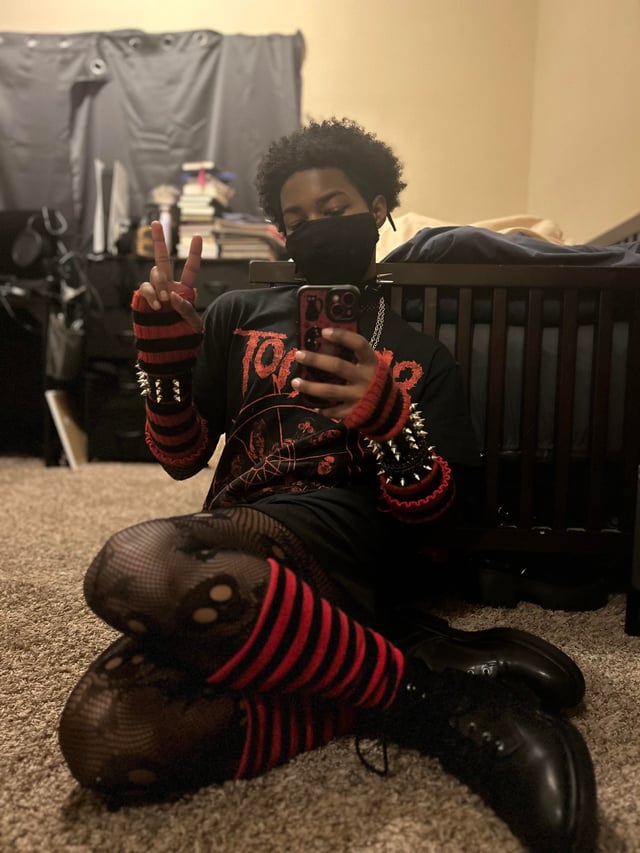 Edgy Casual Femboy with Spiked Arm Warmers and Striped Fishnets Edgy Casual Femboy with Spiked Arm Warmers and Striped Fishnets — Femboy Outfits