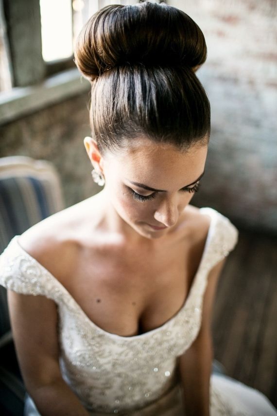 Sleek Voluminous Dark Brown Bun Sleek Voluminous Dark Brown Bun — Top Knot