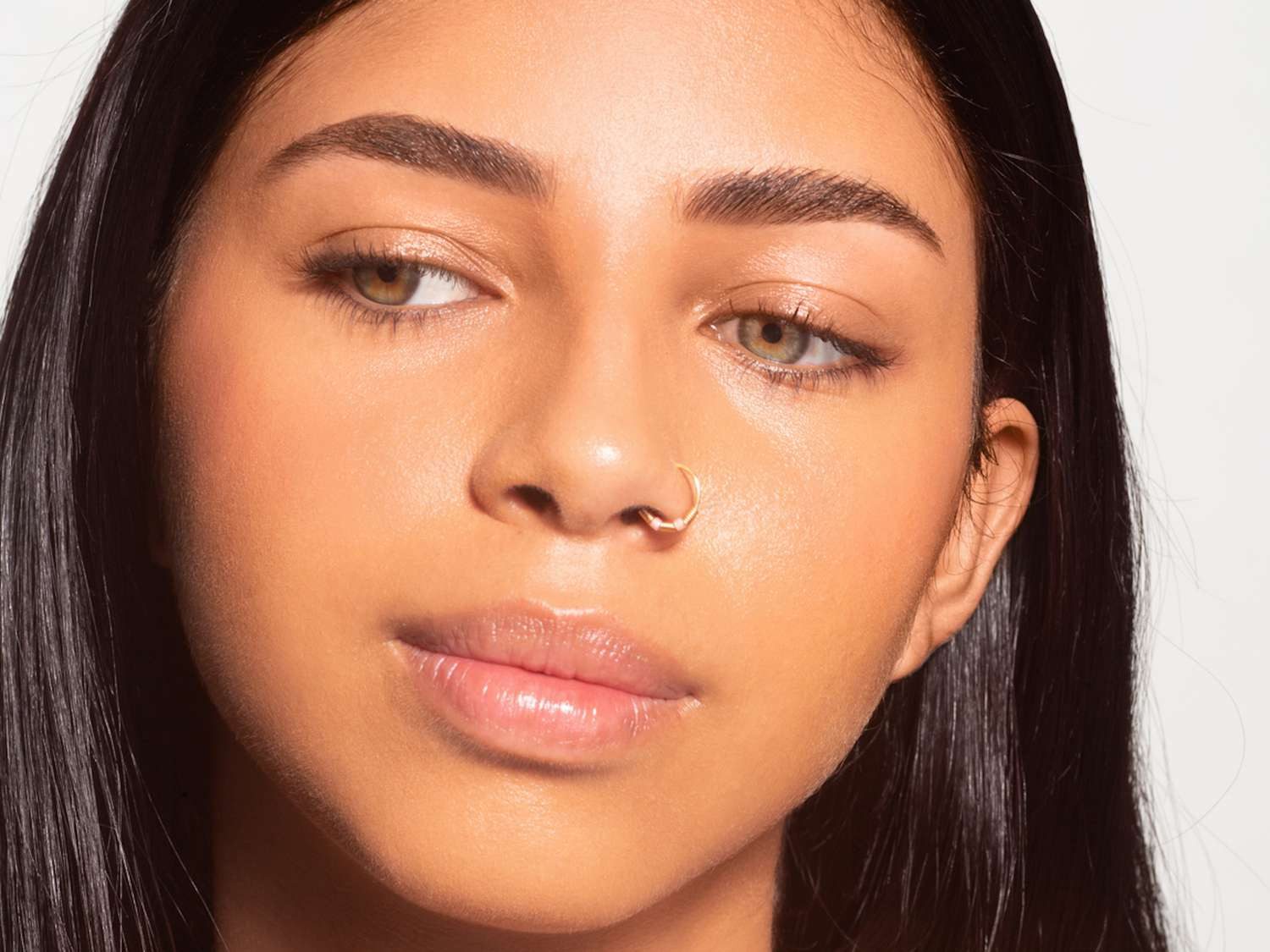 Delicate Gold Hoop Nose Ring for Understated Shine Delicate Gold Hoop Nose Ring for Understated Shine — Nose Piercing Ideas