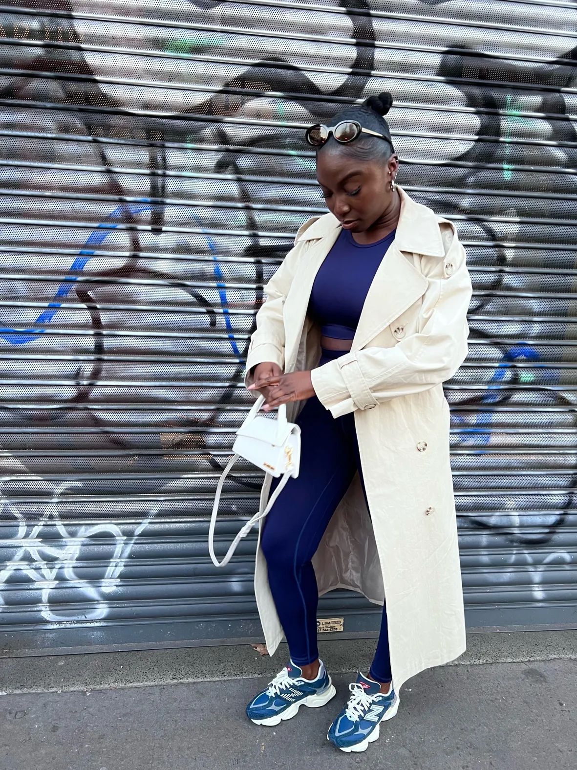 Athleisure Style: Beige Trench Coat with Navy Leggings and Blue/White 9060s Athleisure Style: Beige Trench Coat with Navy Leggings and Blue/White 9060s — New Balance 9060 Outfits