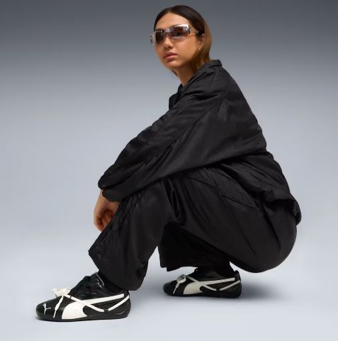 Futuristic Edge: Bomber Jacket, Relaxed Pants, and Black Speedcats Futuristic Edge: Bomber Jacket, Relaxed Pants, and Black Speedcats — Puma Speedcat Outfits