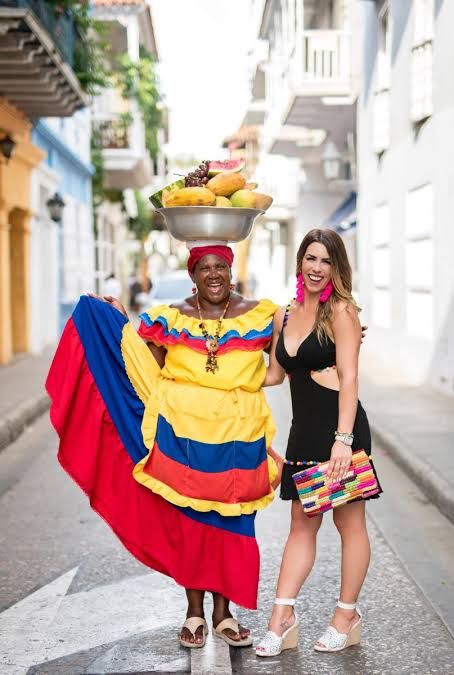 Edgy Evening: Black Cutout Dress with Colorful Clutch — Cartagena Outfits