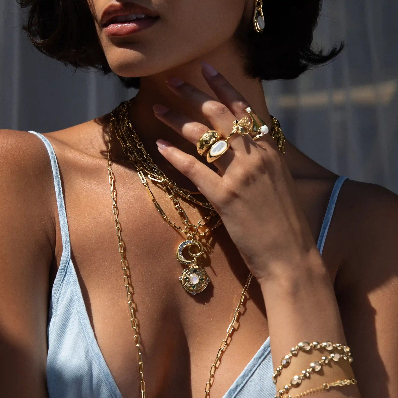 Ornate Locket Pendant with Layered Gold Chains — Locket Necklaces
