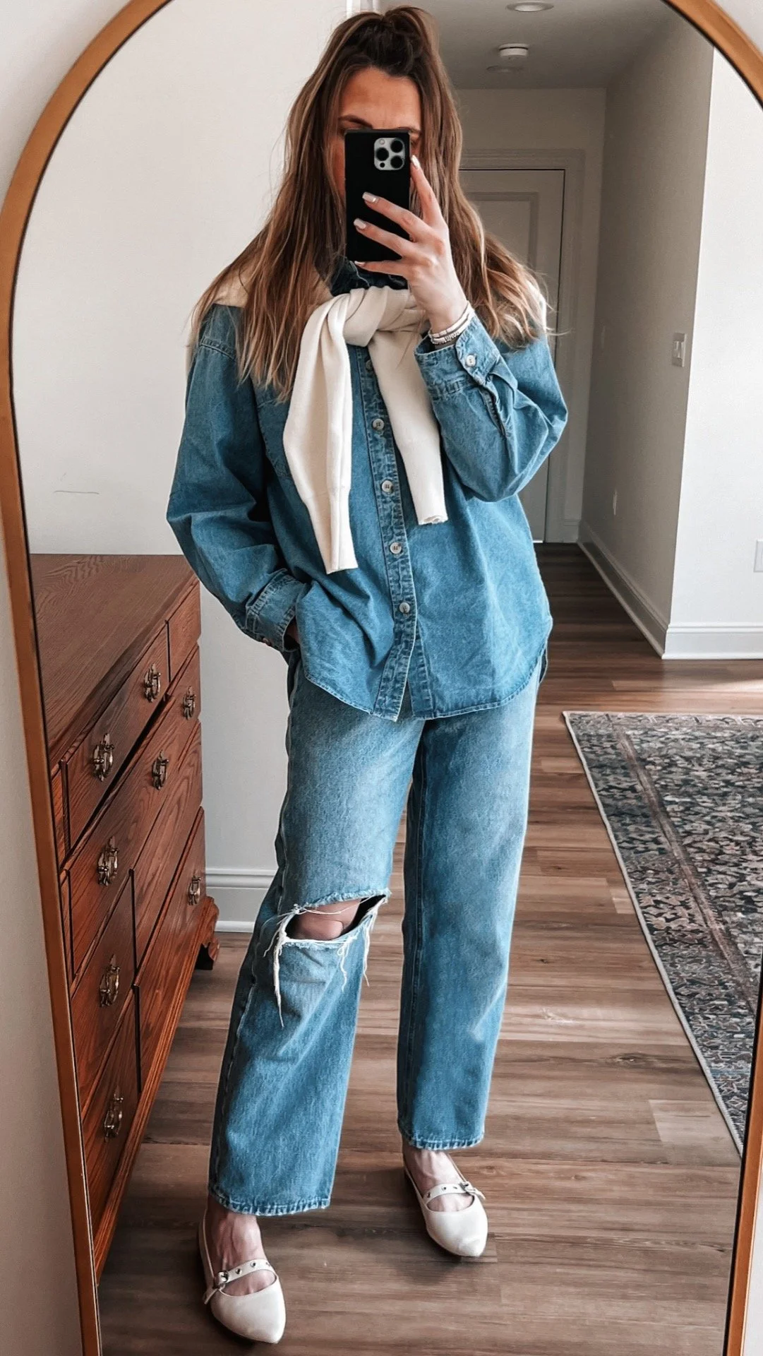 Denim Button-Up with Sweater Draped Over Shoulders and Ripped Jeans Denim Button-Up with Sweater Draped Over Shoulders and Ripped Jeans — Button Up Shirt Outfits