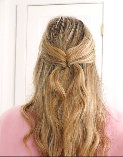 Mid-Back Twisted Knot Half Up — Half Up Half Down Hairstyles