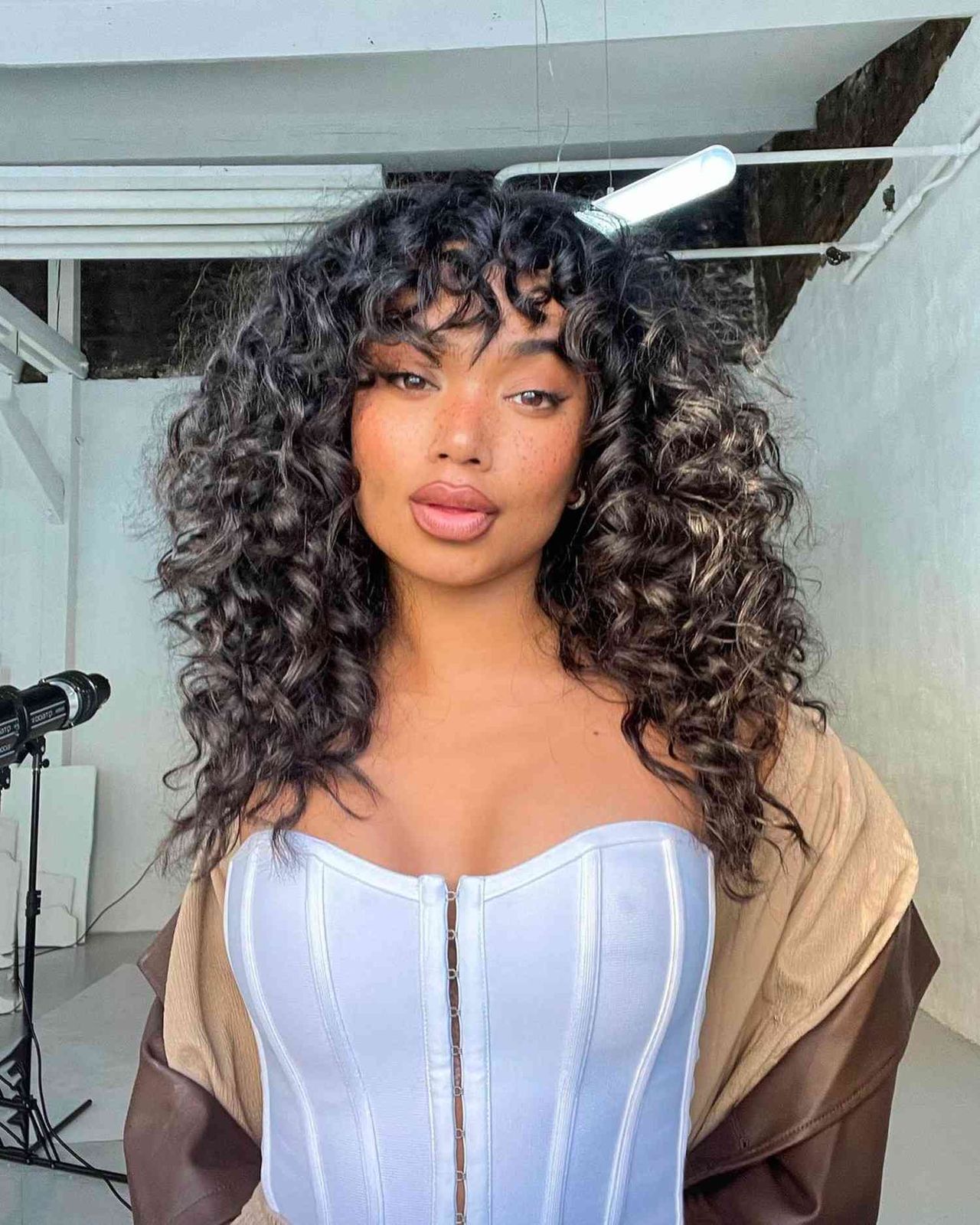 Collarbone Visual Idea — Curly Wolf Cut